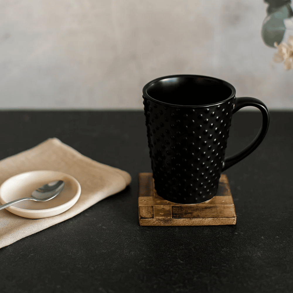 Burnt wood coasters at an angle