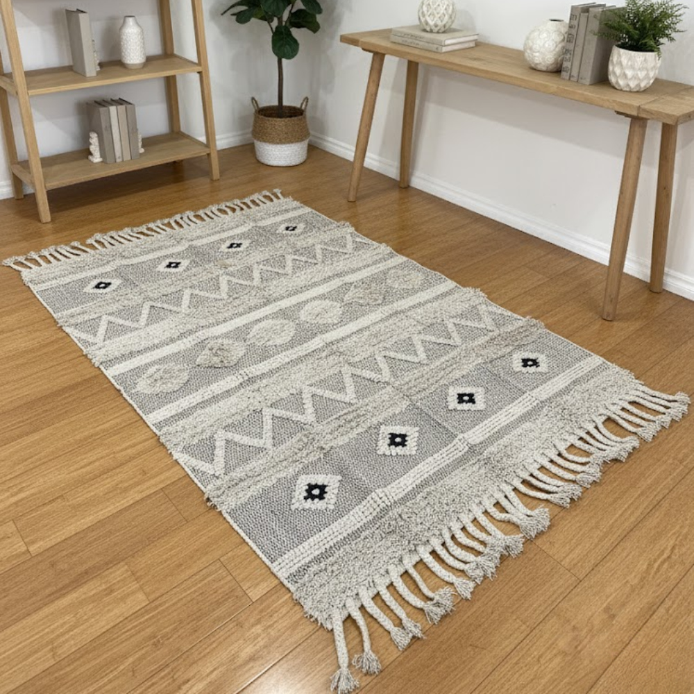 Angled view of the handwoven cotton rug