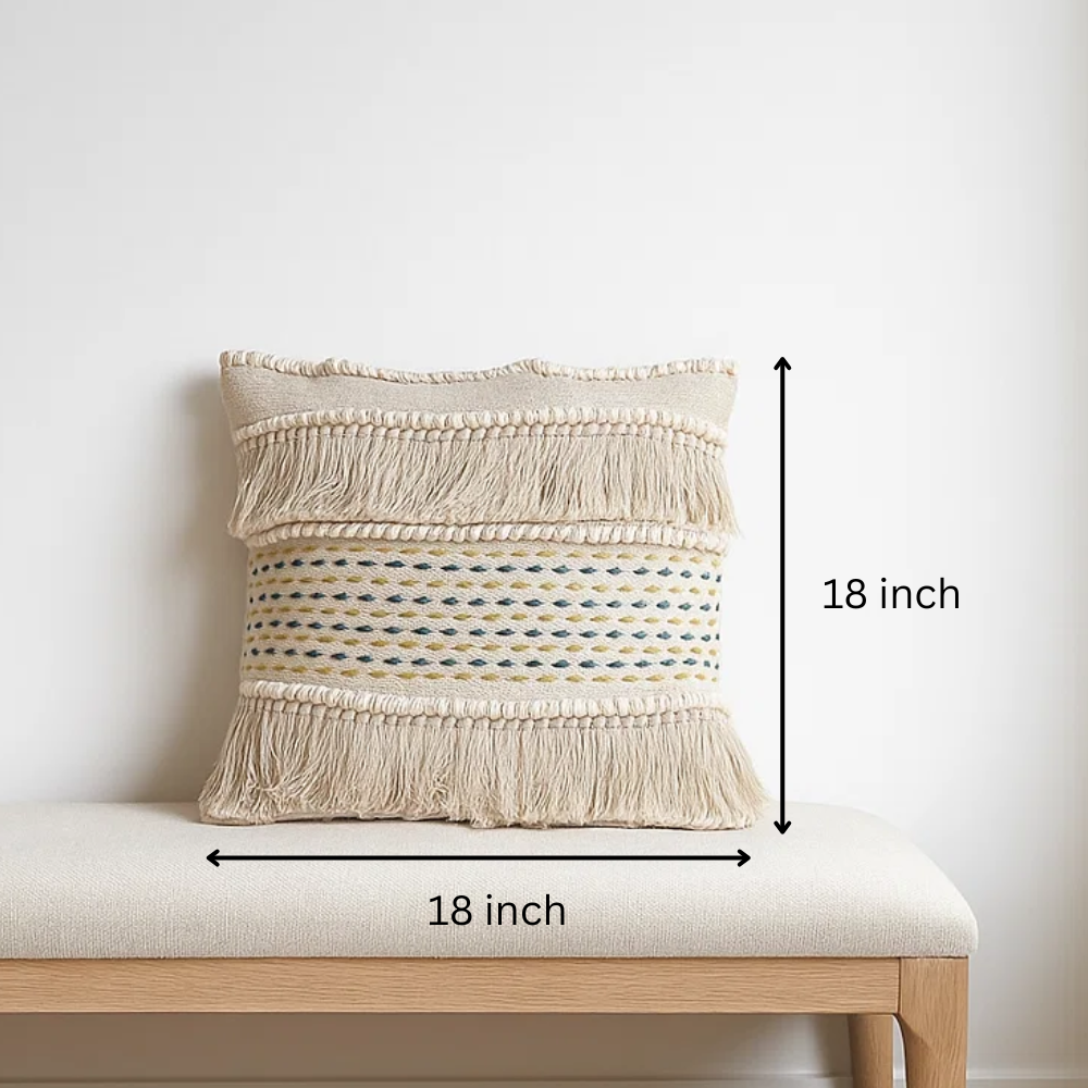 White fringed cushion cover at an angle
