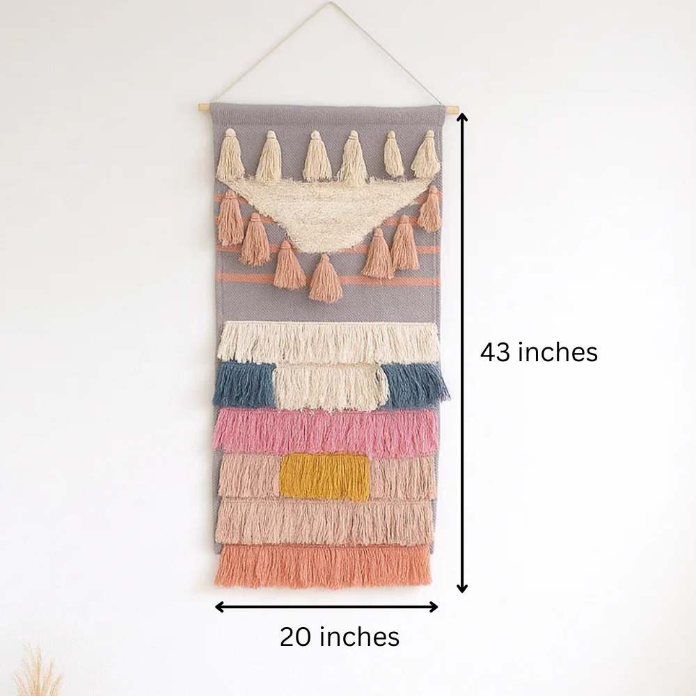 Pastel wool and cotton wall hanging shown at an angle