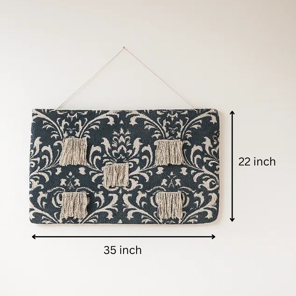 Damask patchwork wall hanging close-up of hand-stitched seams