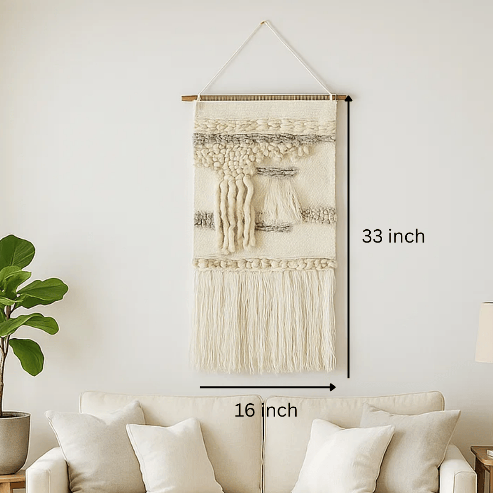Woolen fringe wall hanging above bed