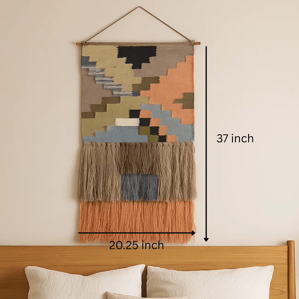 Colour block wool wall hanging detail of fringe at the bottom