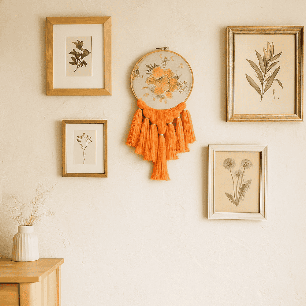 Rose embroidery wall hanging styled in a cottage room