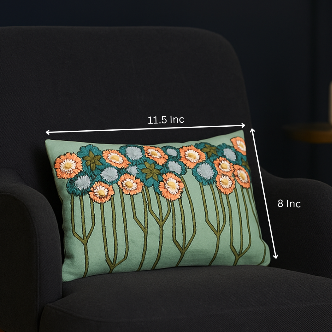 Floral embroidered cushion close-up of stitching