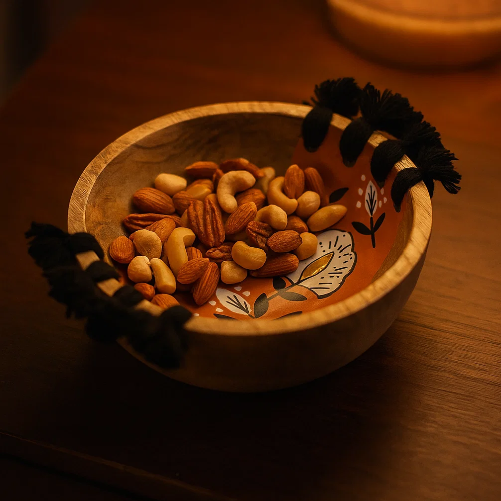 Tasseled wooden bowl at an angle