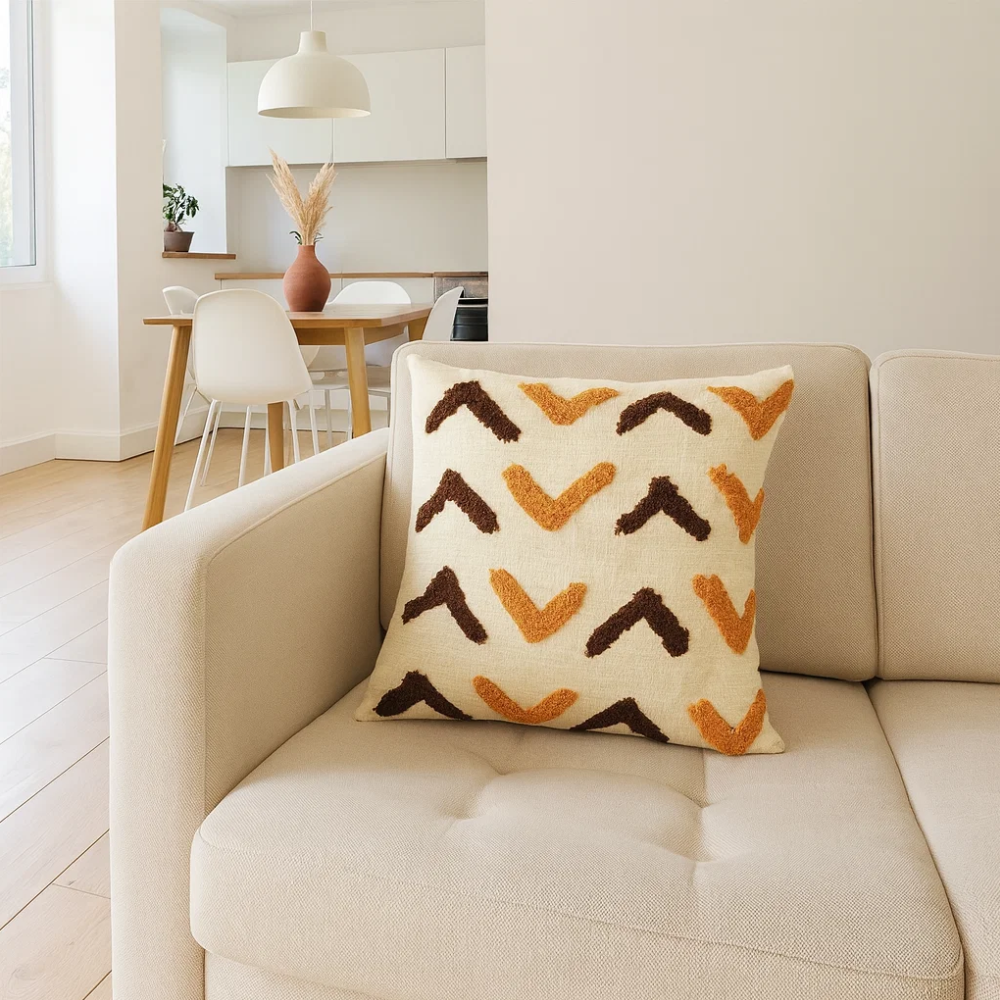 Arrow tufted cushion cover styled on a sofa