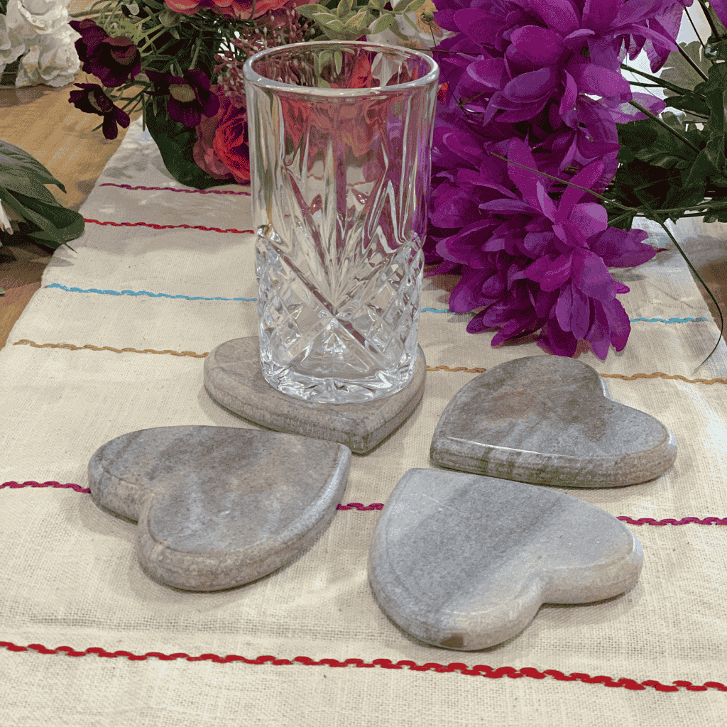 Heart marble coasters styled with a drink