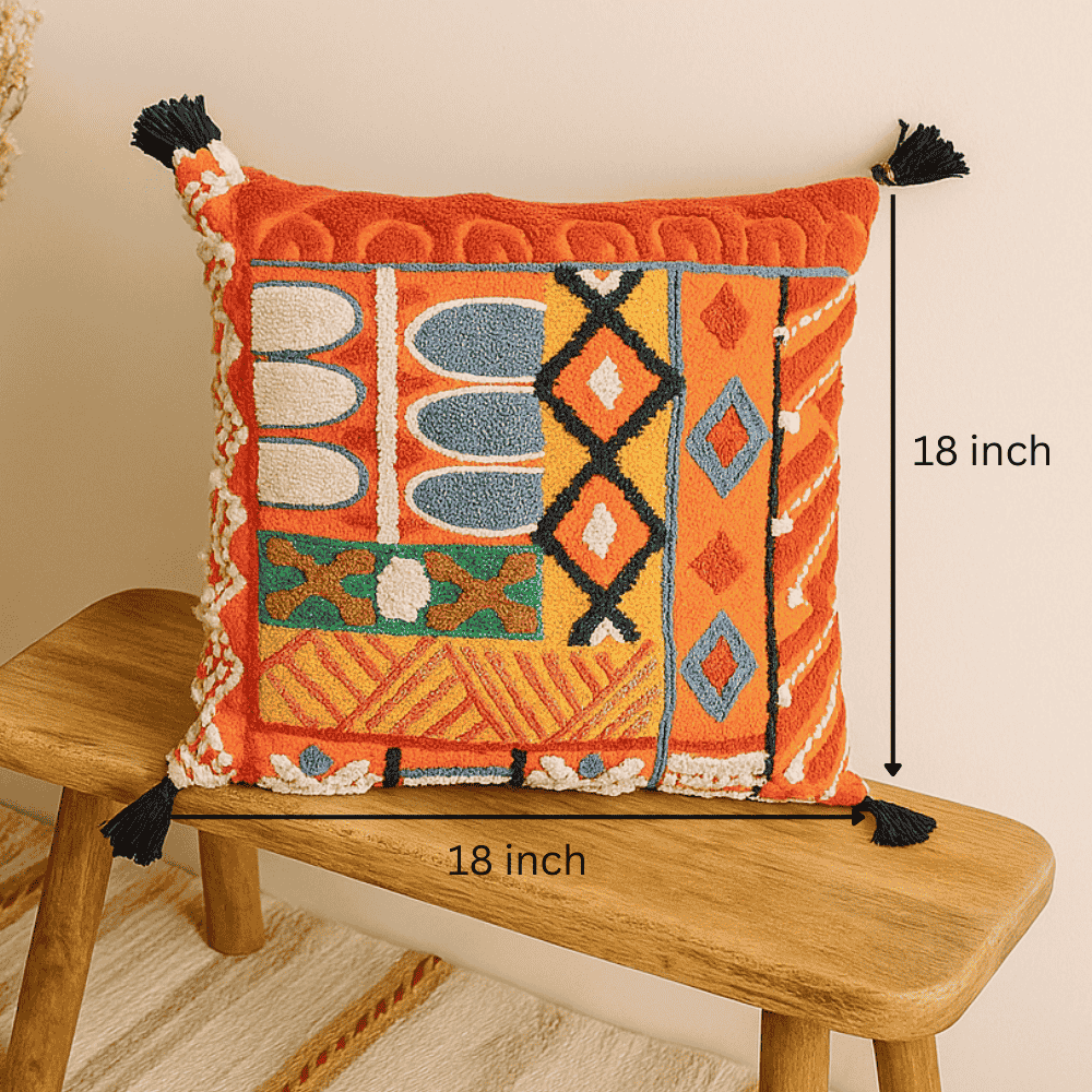 Tangerine embroidered cushion cover detail of corner tassels