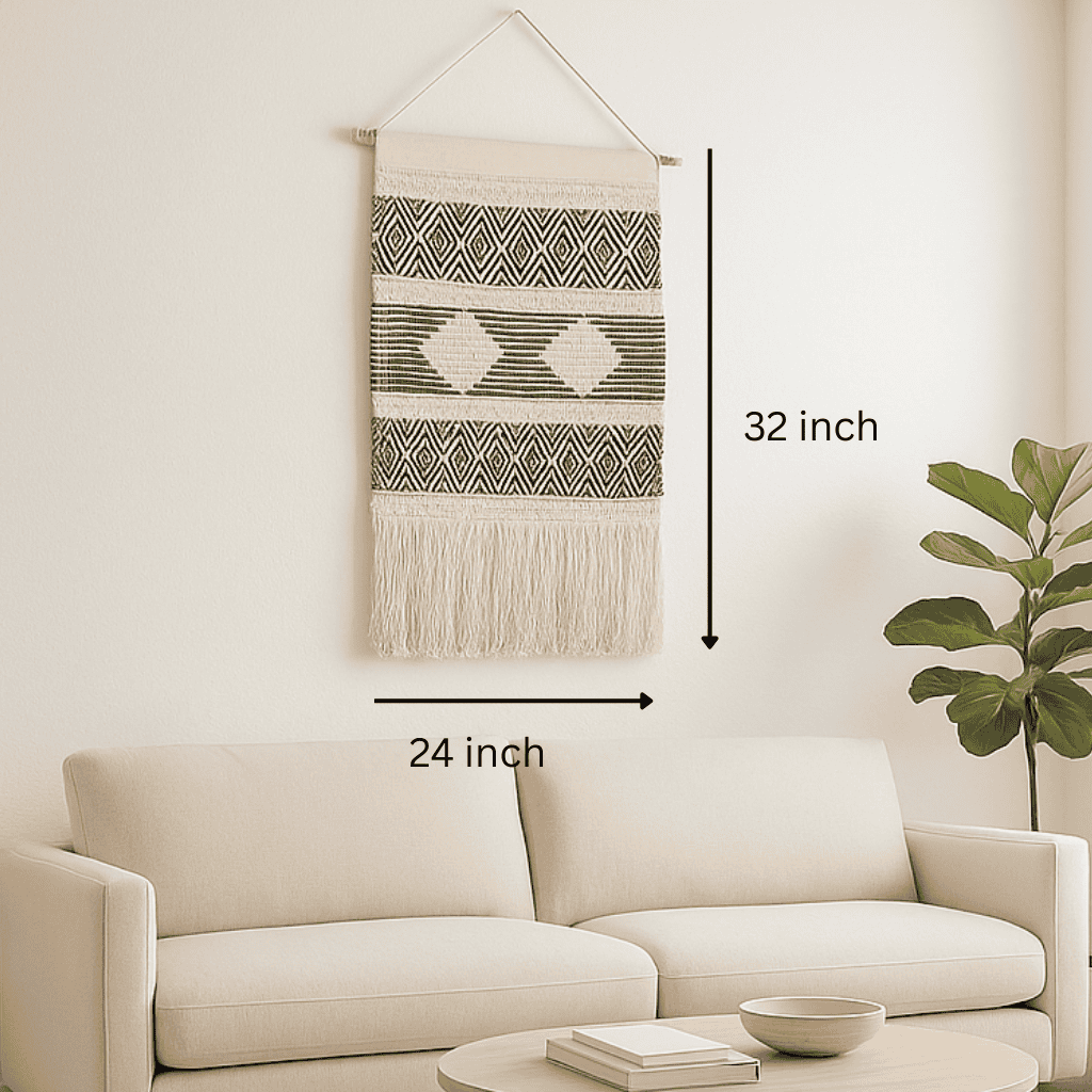 Handwoven geometric cotton wall hanging shown over a console table