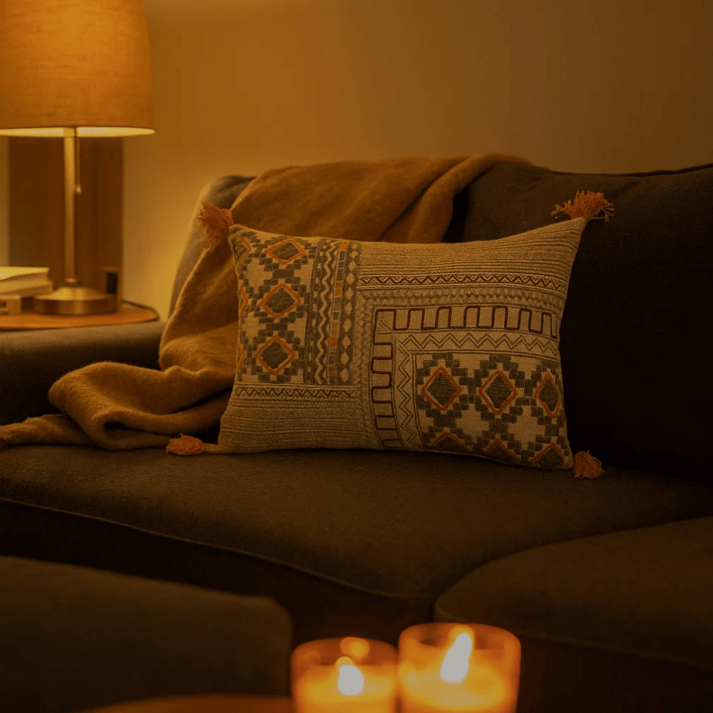 Printed embroidered lumbar cushion cover at an angle