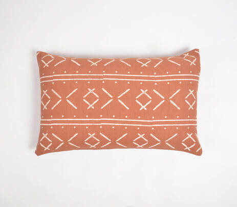 Tribal monochrome lumbar cushion cover styled on a bed