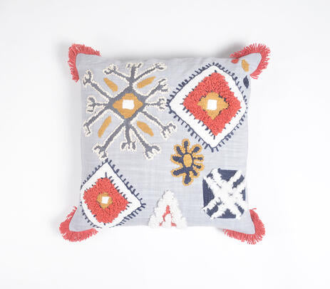 Fringed embroidered cushion cover paired with other cushions