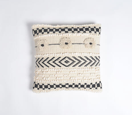 Geometric woven cushion cover paired with other cushions