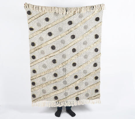Pom pom throw blanket lifestyle shot