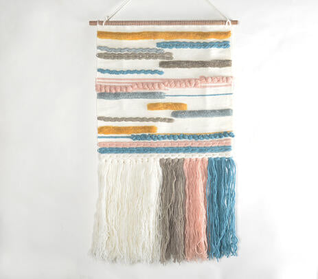 Broken lines wool wall hanging on a plain wall