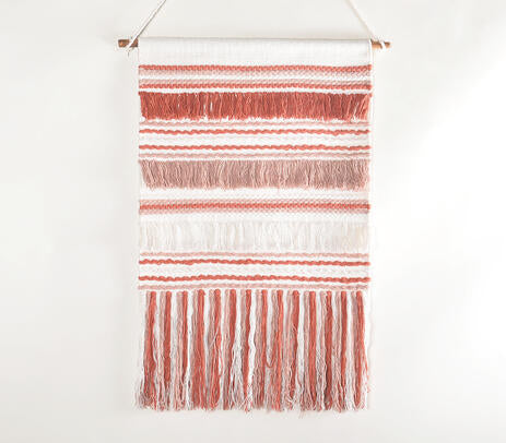 Bayadère stripe cotton wall hanging on a painted plaster wall