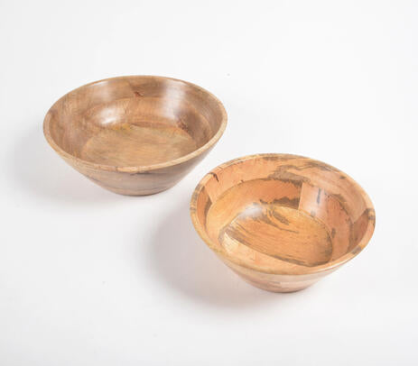 Mango wood salad bowls at an angle