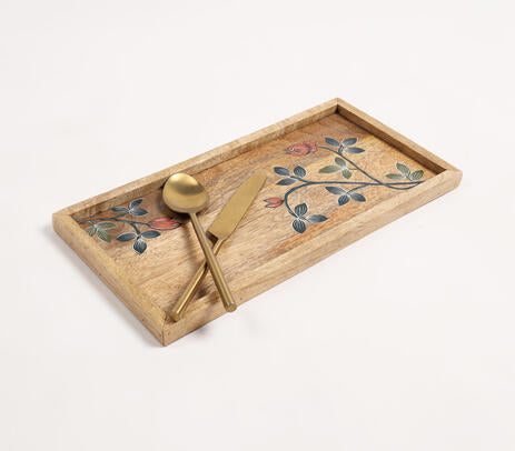 Botanical mango wood tray paired with tableware