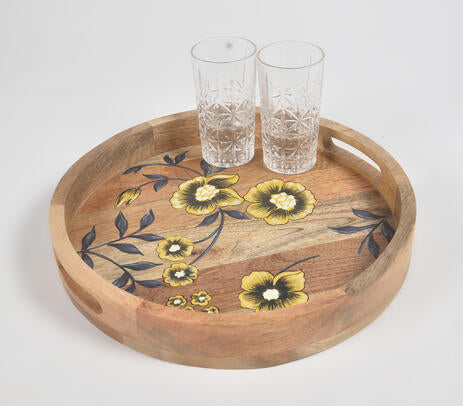 Printed mango wood tray paired with tableware