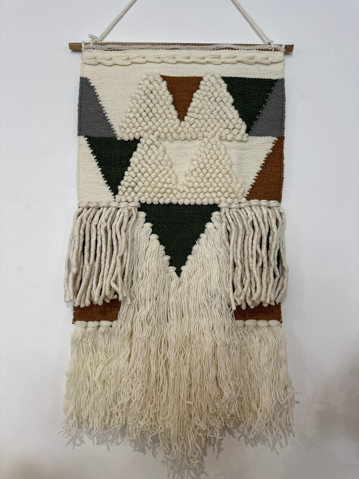 Loop and pile wool wall hanging detail of cut pile area