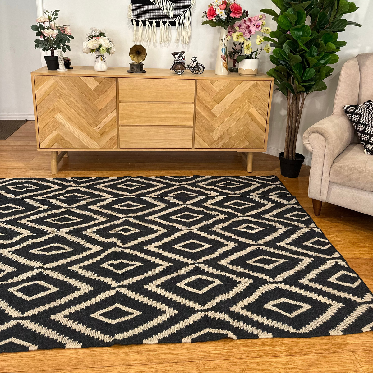Angled view of the handwoven diamond rug