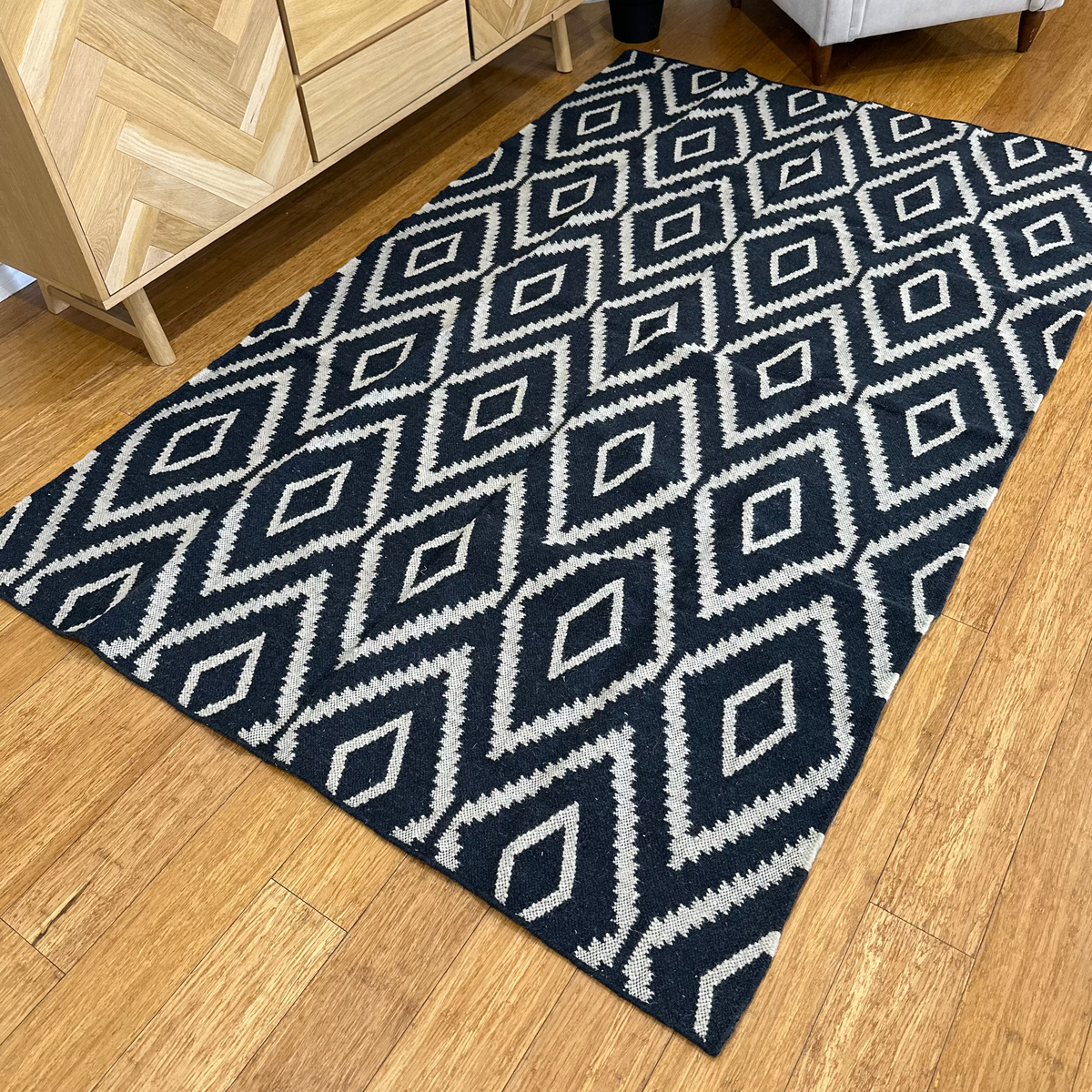 Overhead view of the diamond patterned rug laid flat