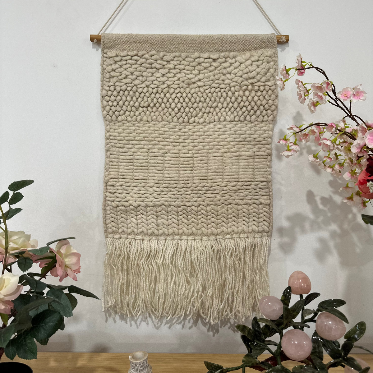 Boho wool fringe wall hanging detail of wood rod