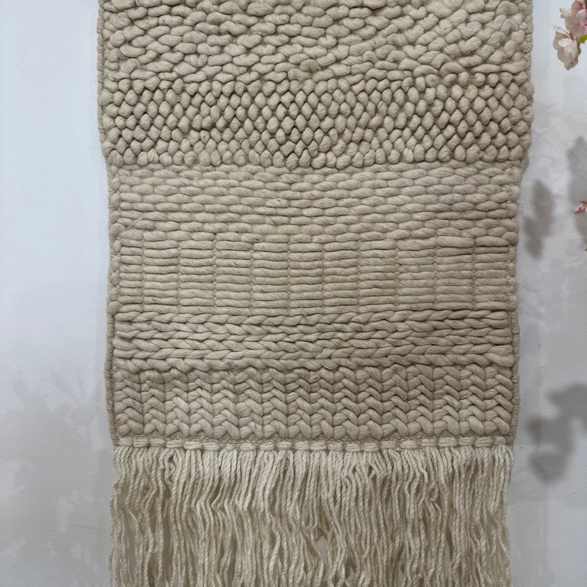 Boho wool fringe wall hanging close-up of wool yarn