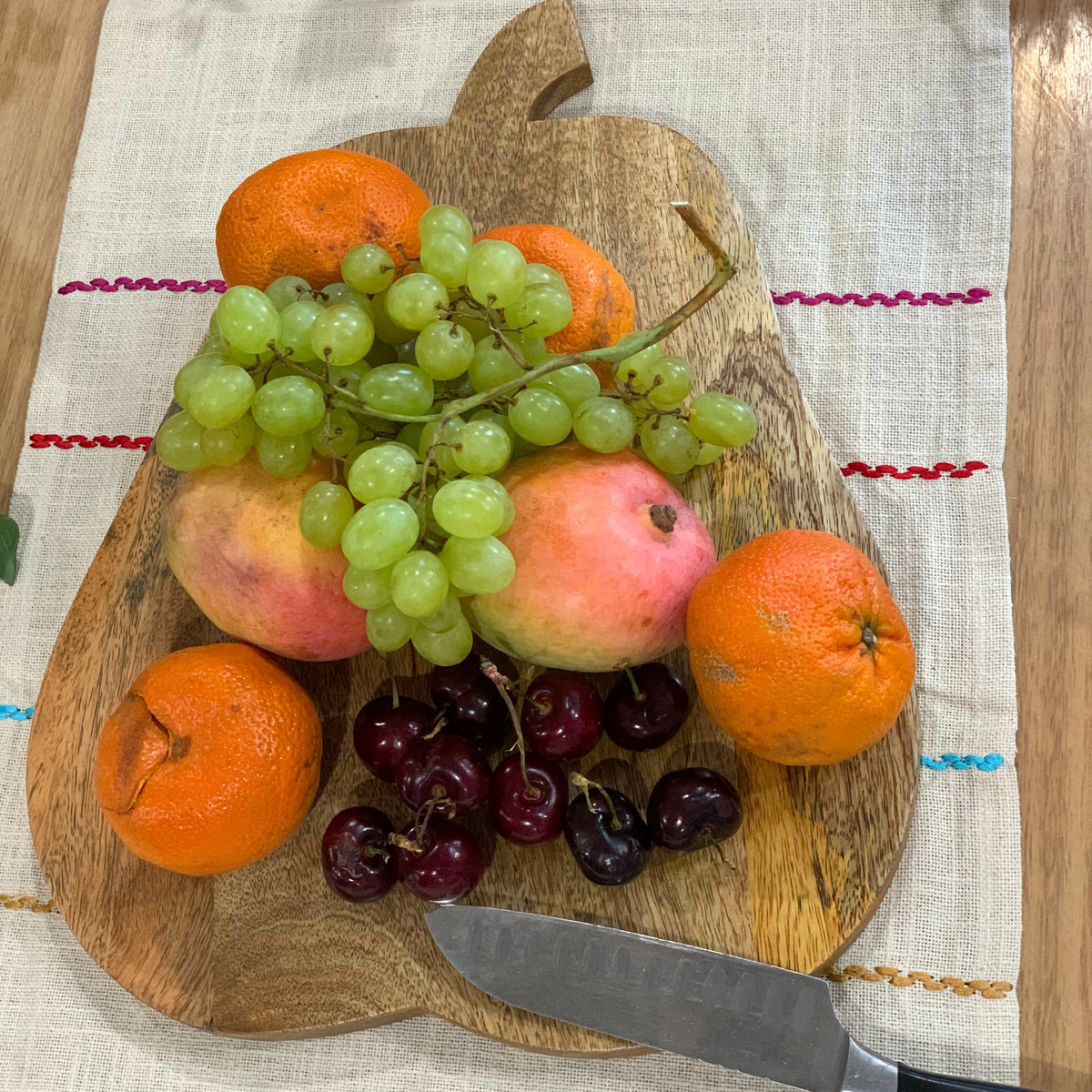 Pear shaped chopping board wood grain