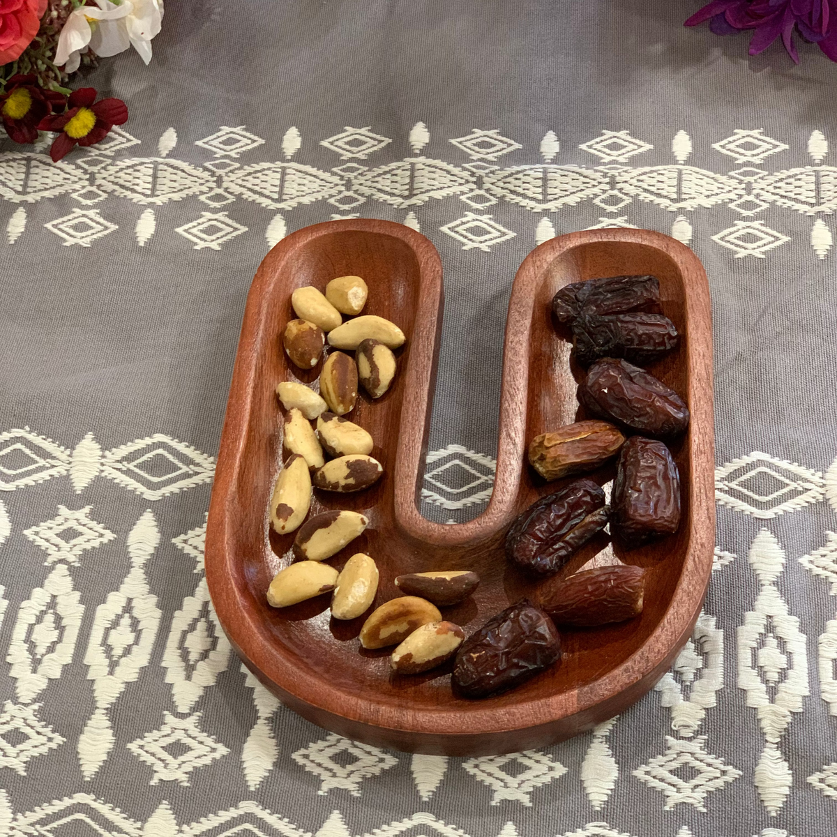 Magnet shaped platter paired with snacks