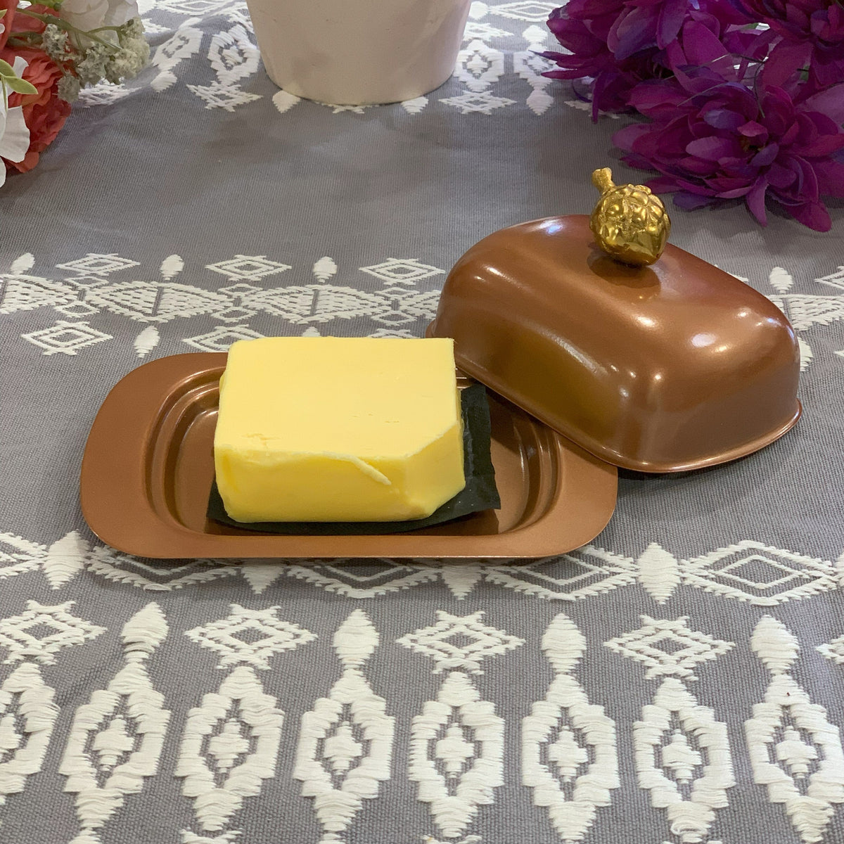 Steel butter dish with lid in place