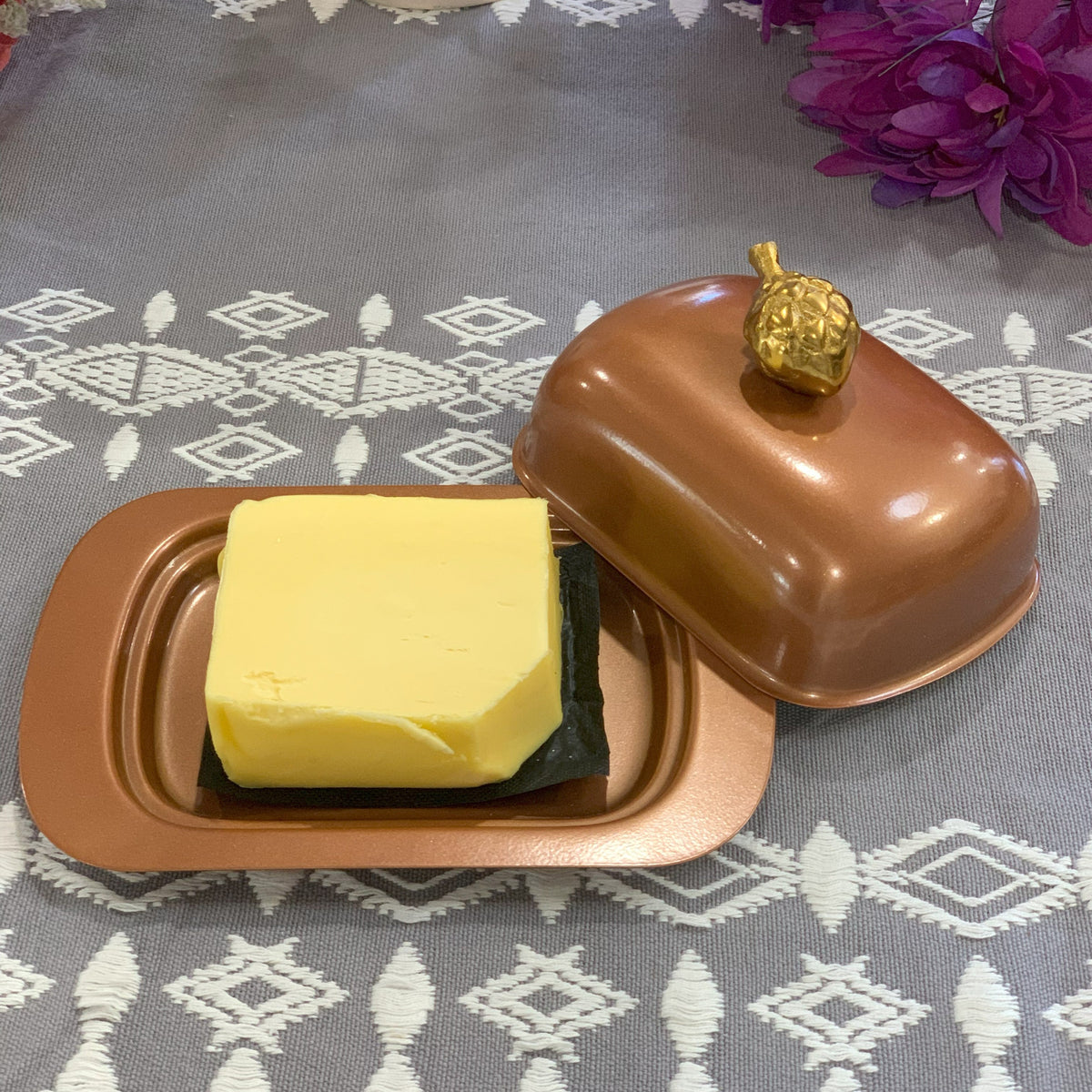 Steel butter dish in kitchen setting