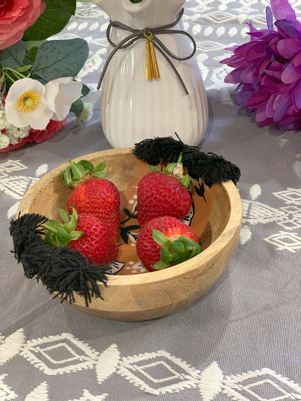 Tasseled wooden bowl full view