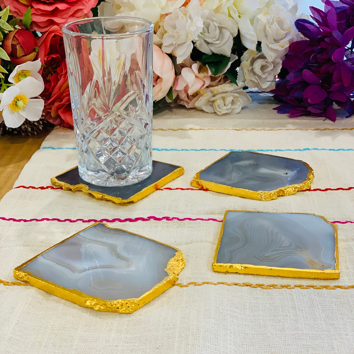 Agate coasters paired with glassware