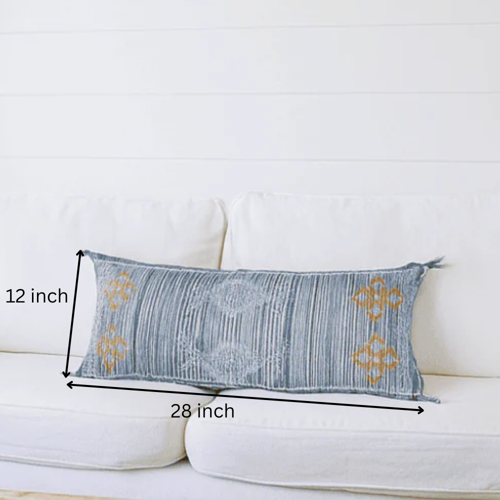 Coastal cushion cover styled on a sofa