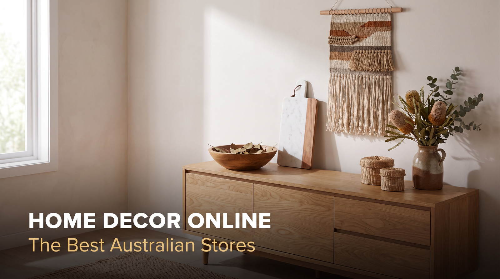 Styled sideboard with wooden bowl, marble board, baskets and a handwoven wall hanging above