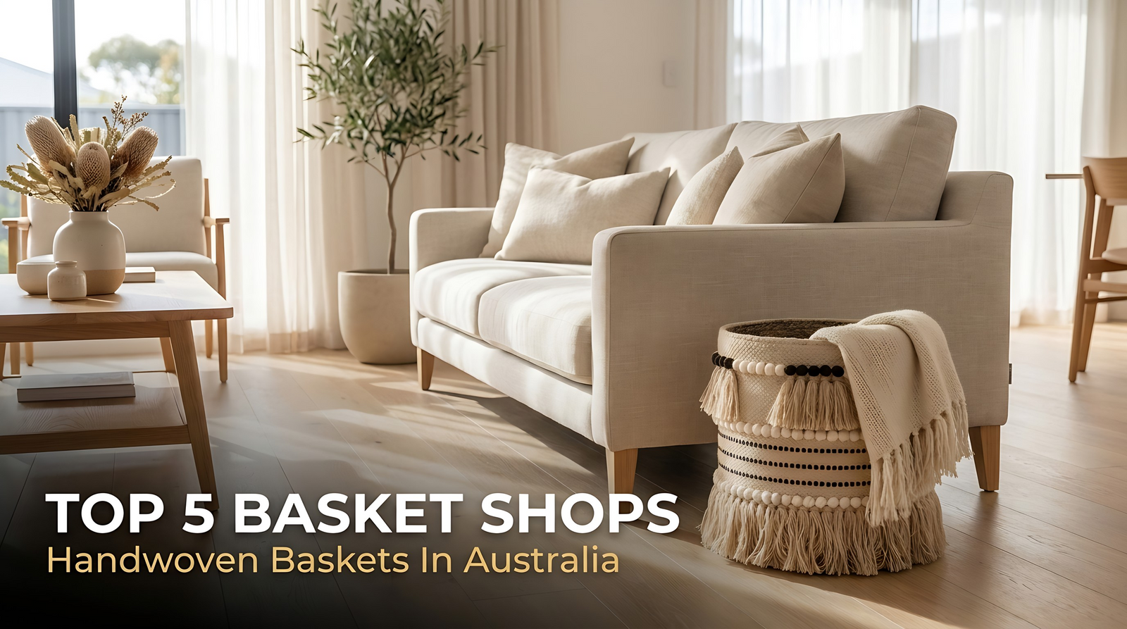 Handwoven jute basket with a soft cotton fringe holding a throw beside a linen sofa