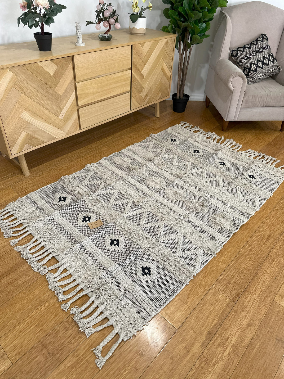 Textured Rug with Panels &amp; Braided Tassels
